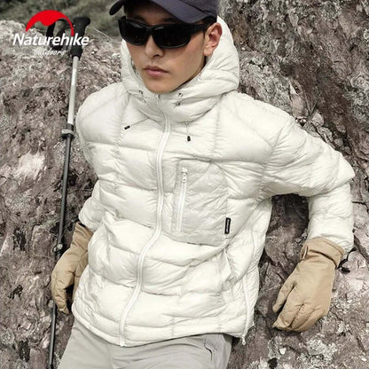 Person wearing Naturehike outdoor warm gloves using smartphone in cold weather